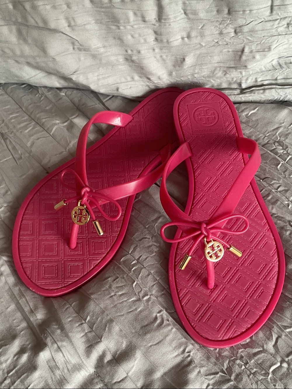 Tory Burch Hot Pink Bow Jelly Thong Sandals with Gold Logo Charm